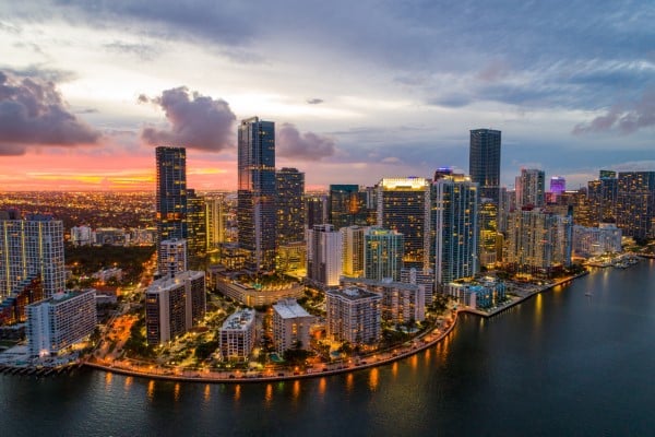 Aerial helicopter photo of Brickell on the bay Miami Florida twilight